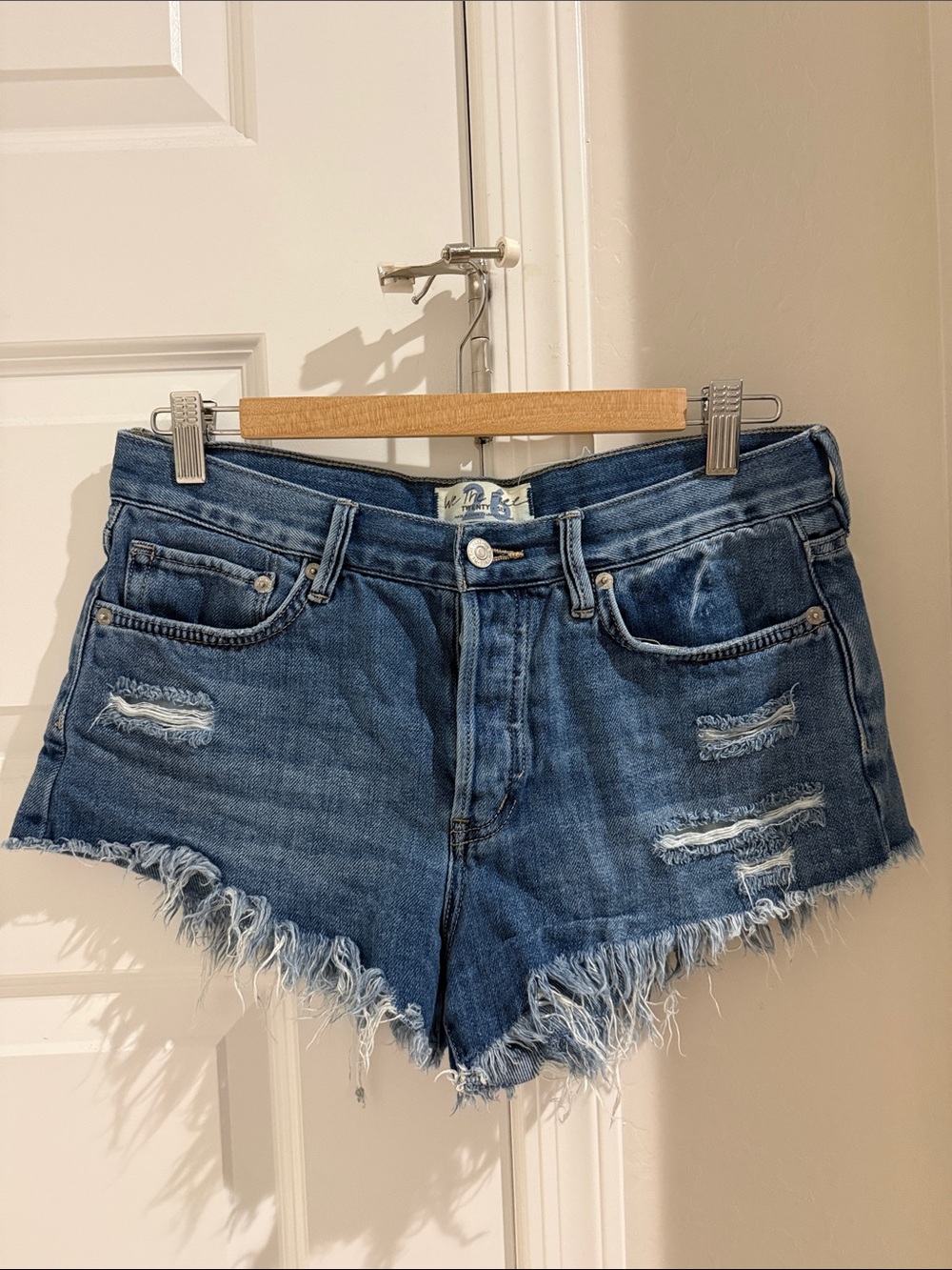 We The Free Distressed Blue Denim Cutoff Shorts
